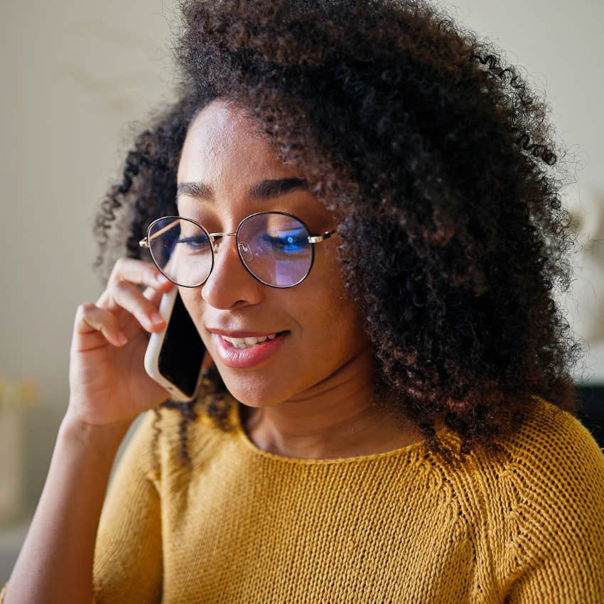homebody on the phone canceling plans saying next time