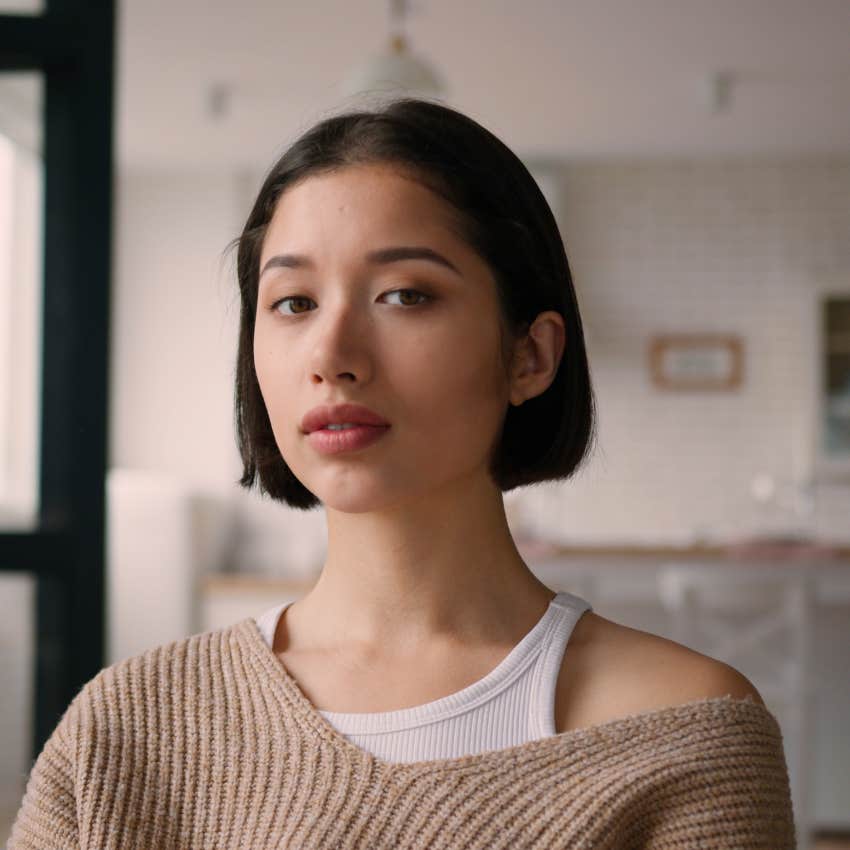 woman who doesn't trust others likes to tell people she's fine on her own
