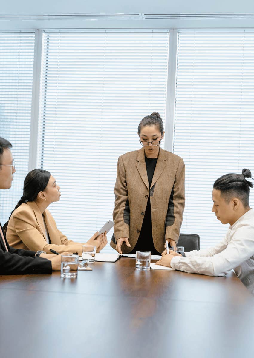 pretentious professional leading team meeting