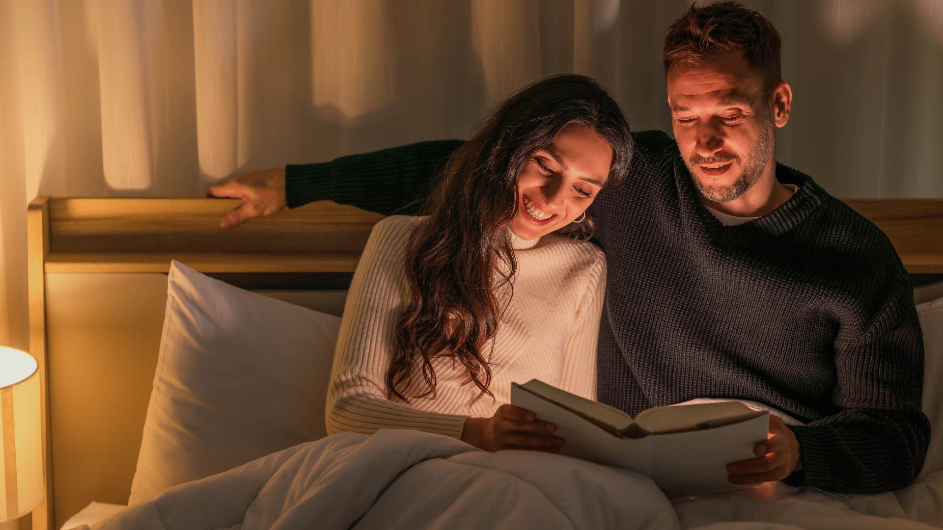 couple enjoying quality time together in room as they have fewer arguments at night