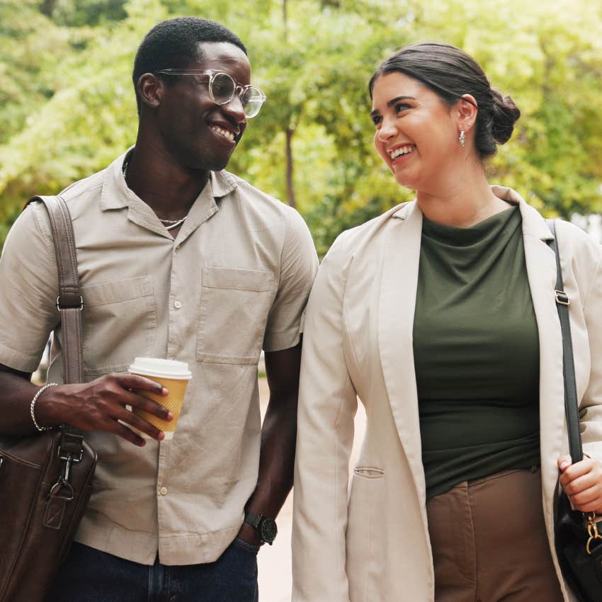 couple taking a walk together outside smiling
