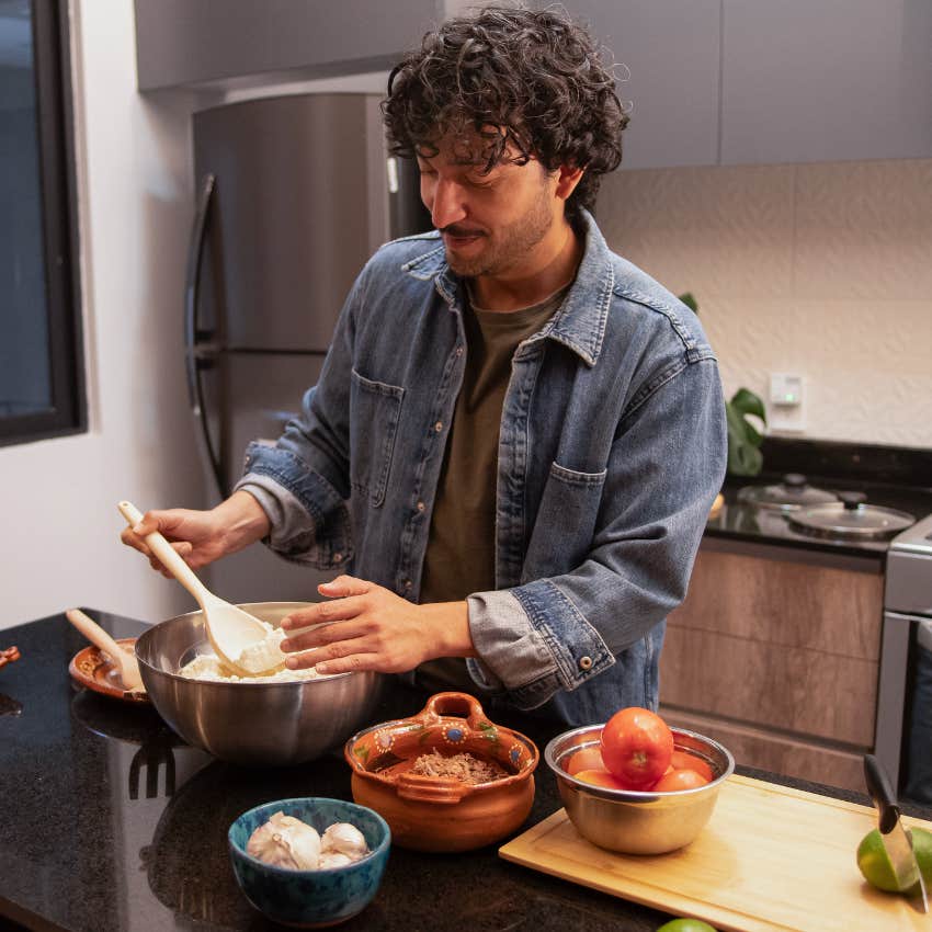 Gen X man cooking a meal from scratch