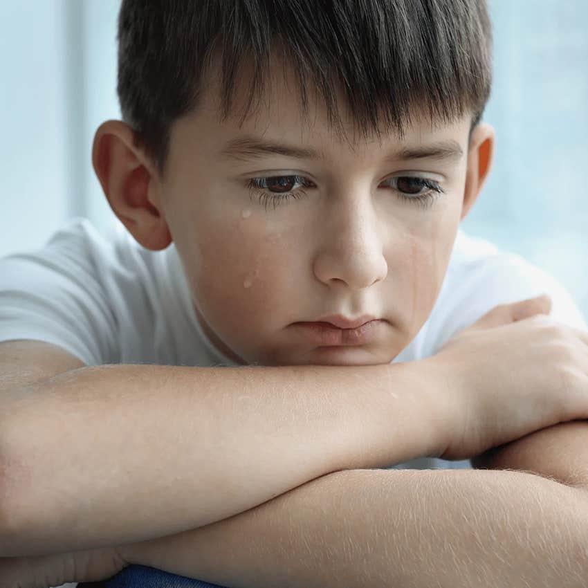 boy crying because he's isolated