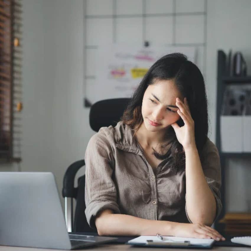 woman feeling guilty about her success and downplaying an accomplishment