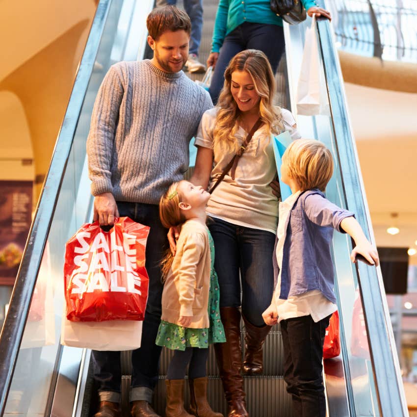 happy family shopping at the mall in the 1980s