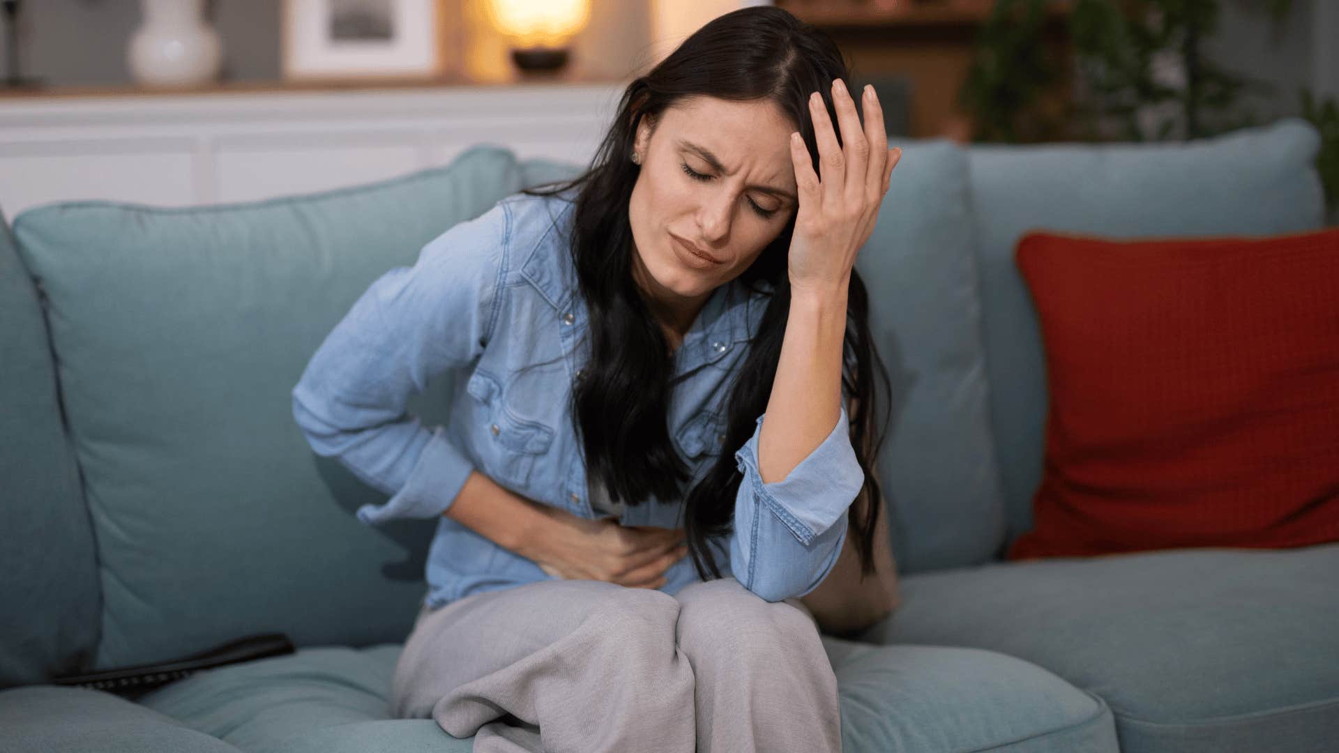 woman not doing OK and experiencing unexpected physical symptoms 