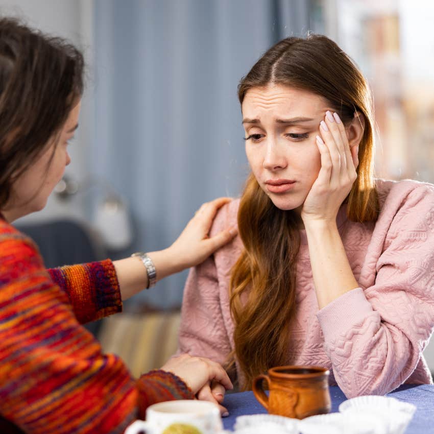 narcissistic woman making herself a victim while friend comforts her