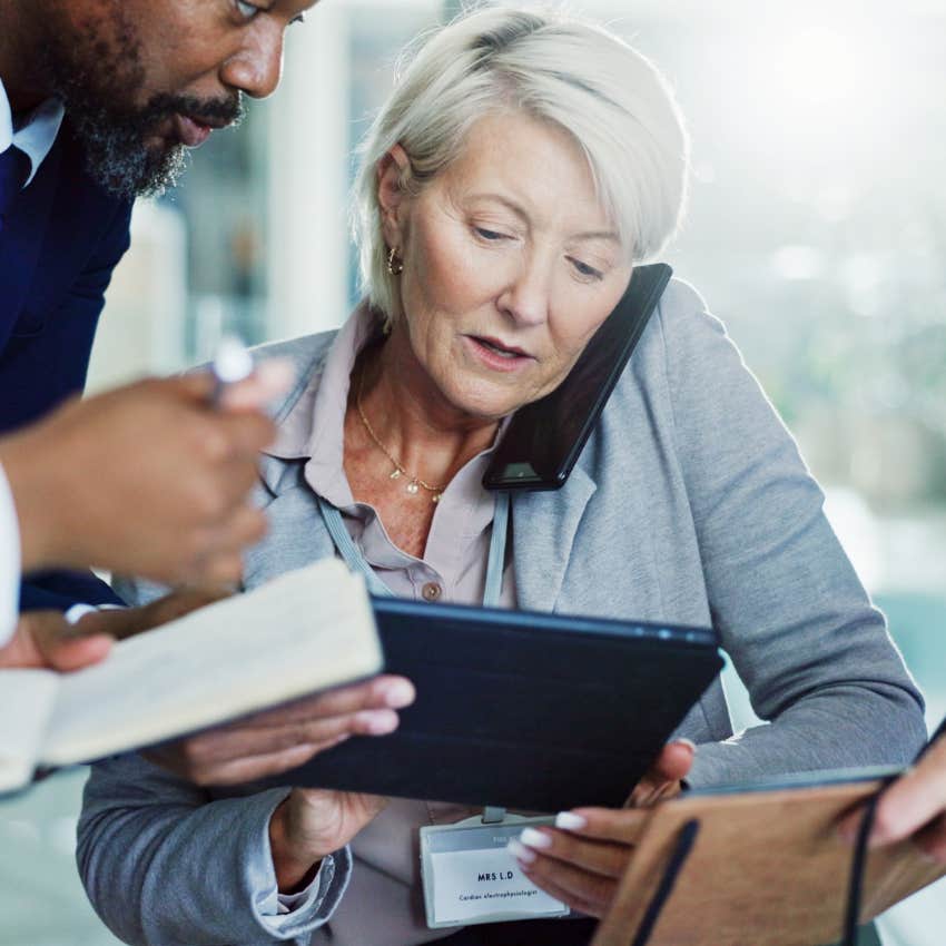 empathic woman in high-stress environment at work