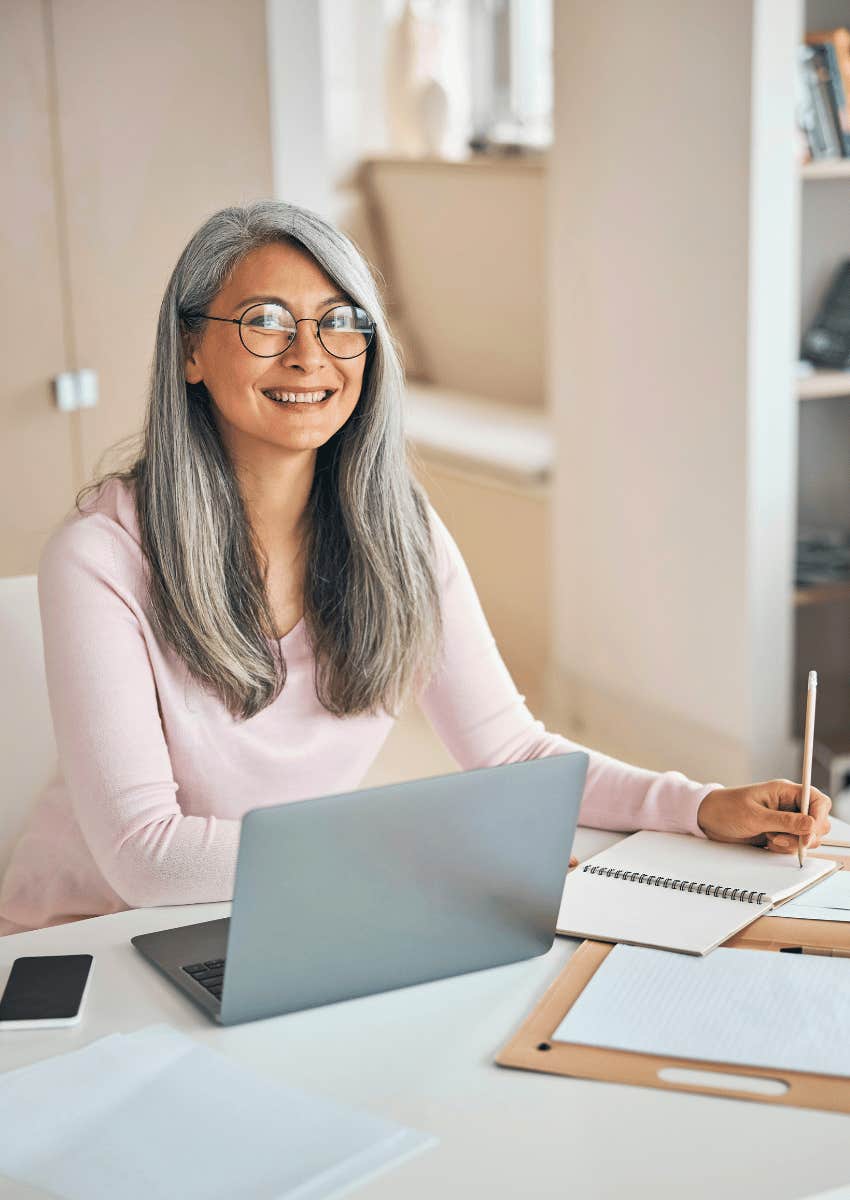 smiling older employee not wanting to retire