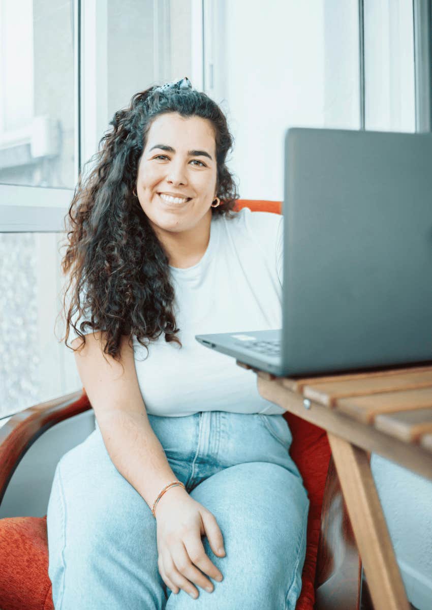 smiling self-aware woman