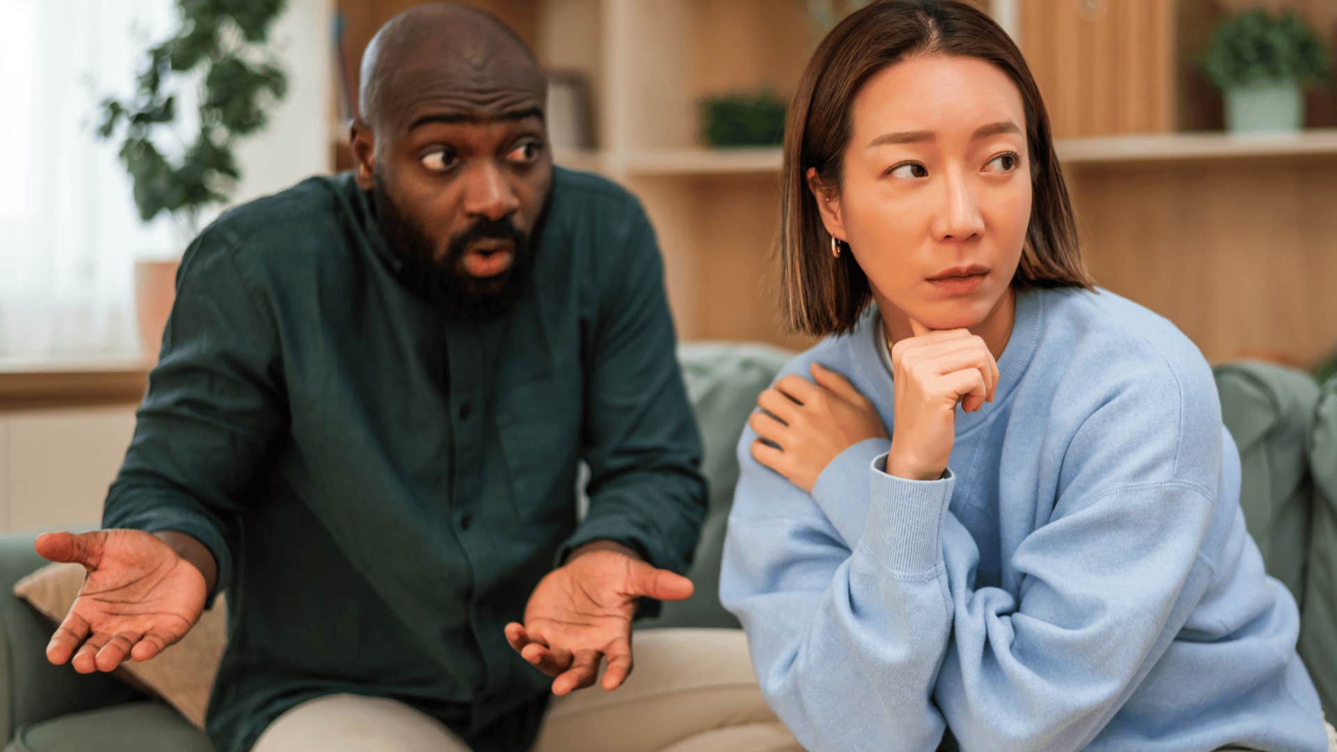 frustrated man being held to an unrealistic image by his partner