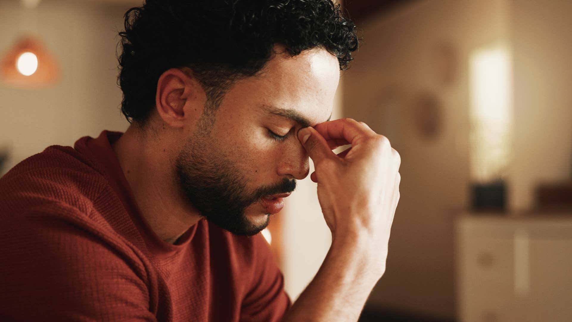 man struggling with a pressure to compete feeling stressed