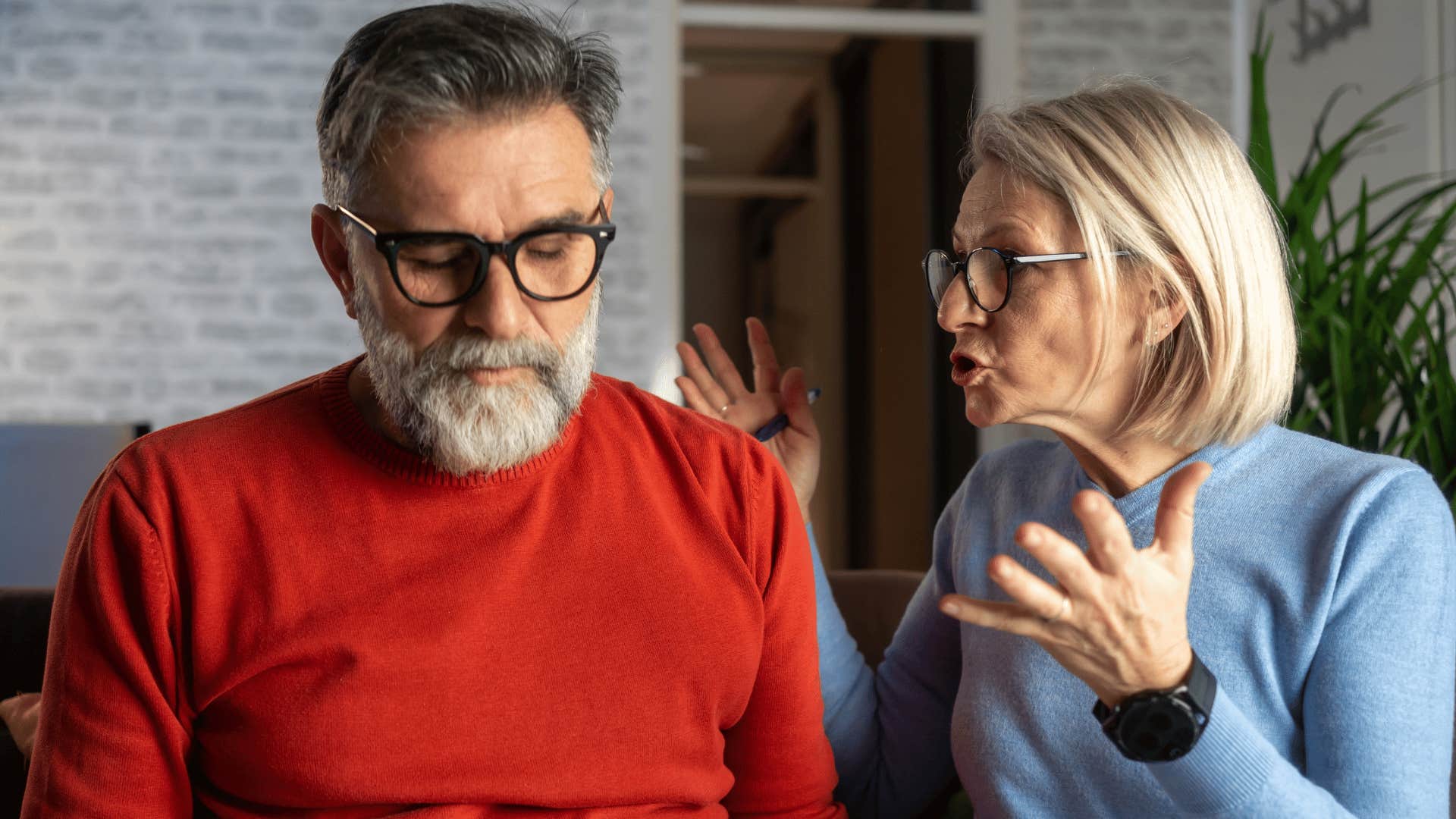man struggling to trust his partner's words in disagreement