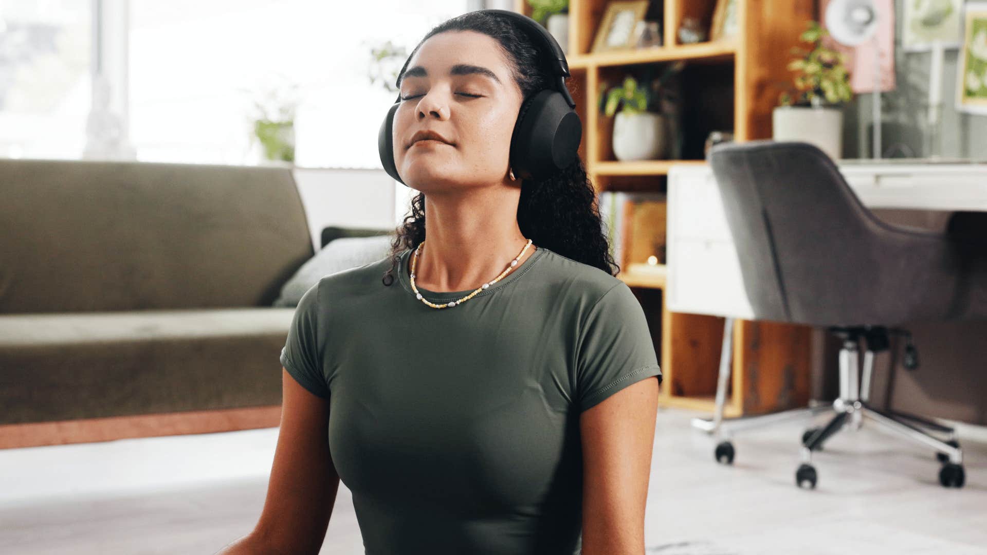 woman regulating her emotions while meditating