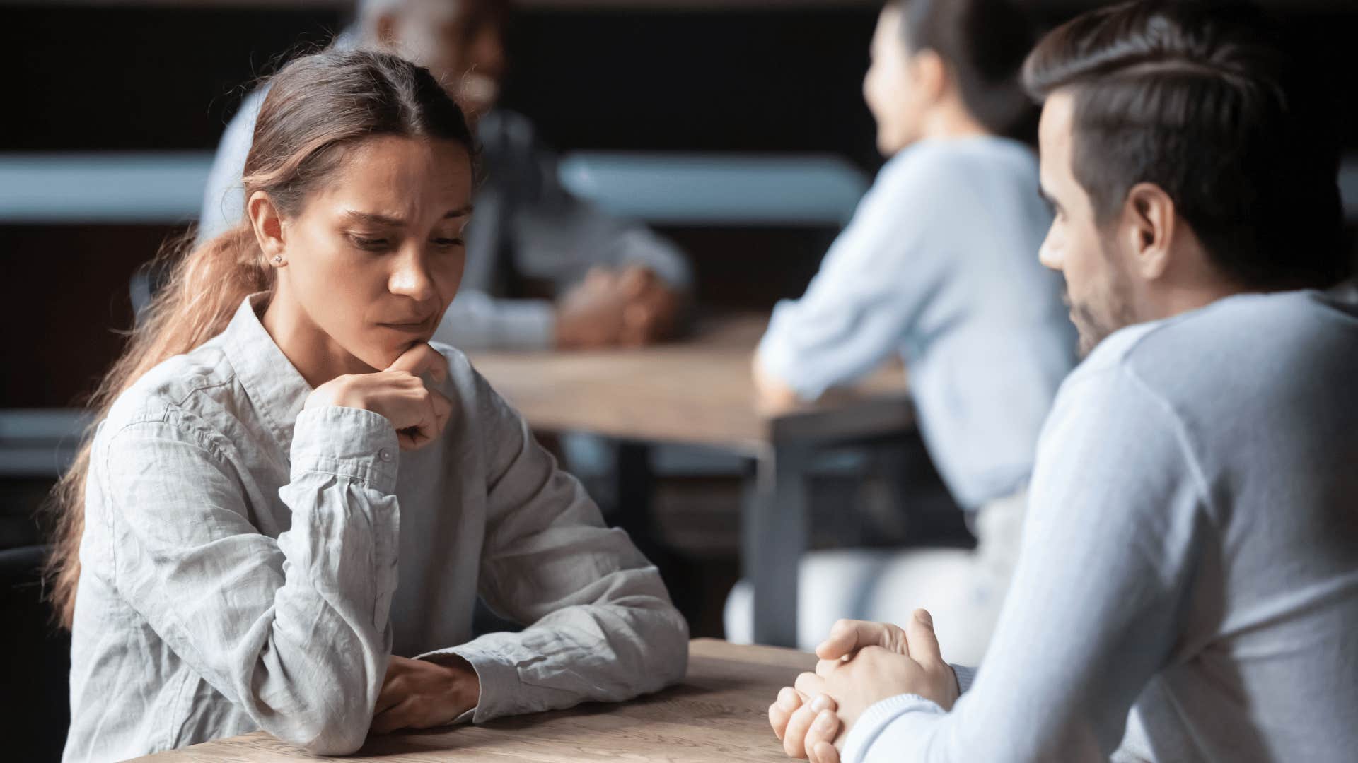 woman realizing love doesn't have to be earned in conversation with partner