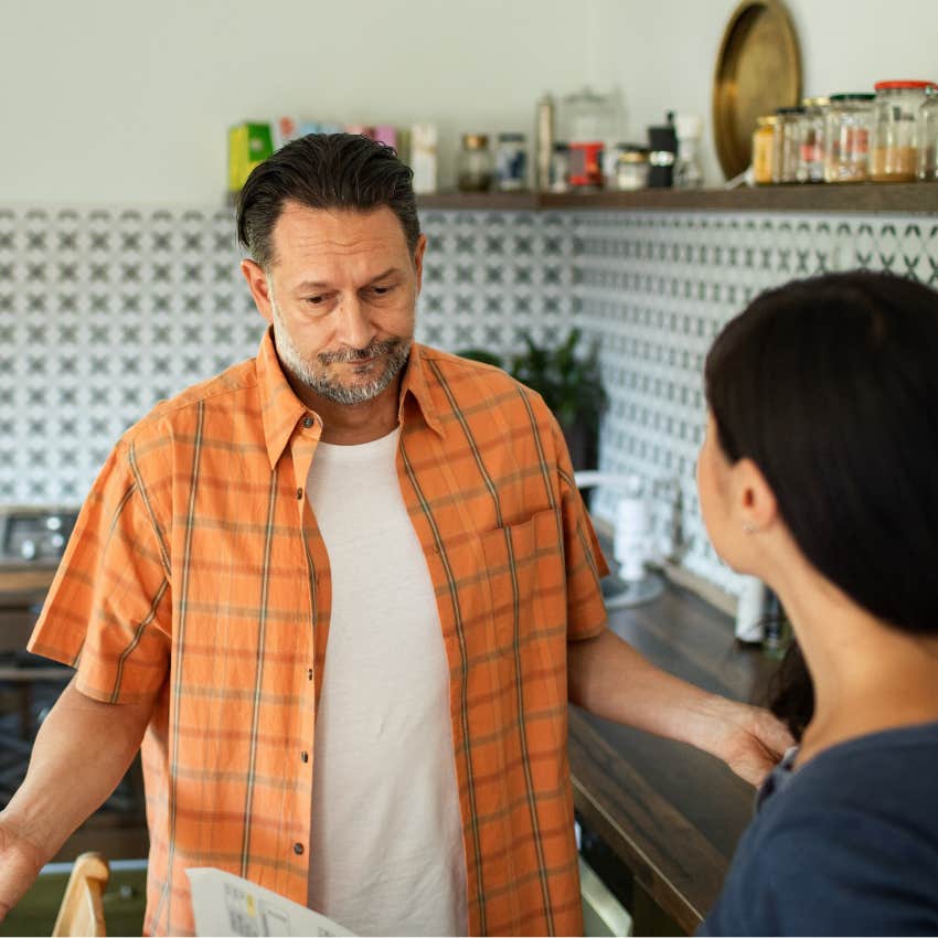 rude man shrugging telling wife sorry you feel that way
