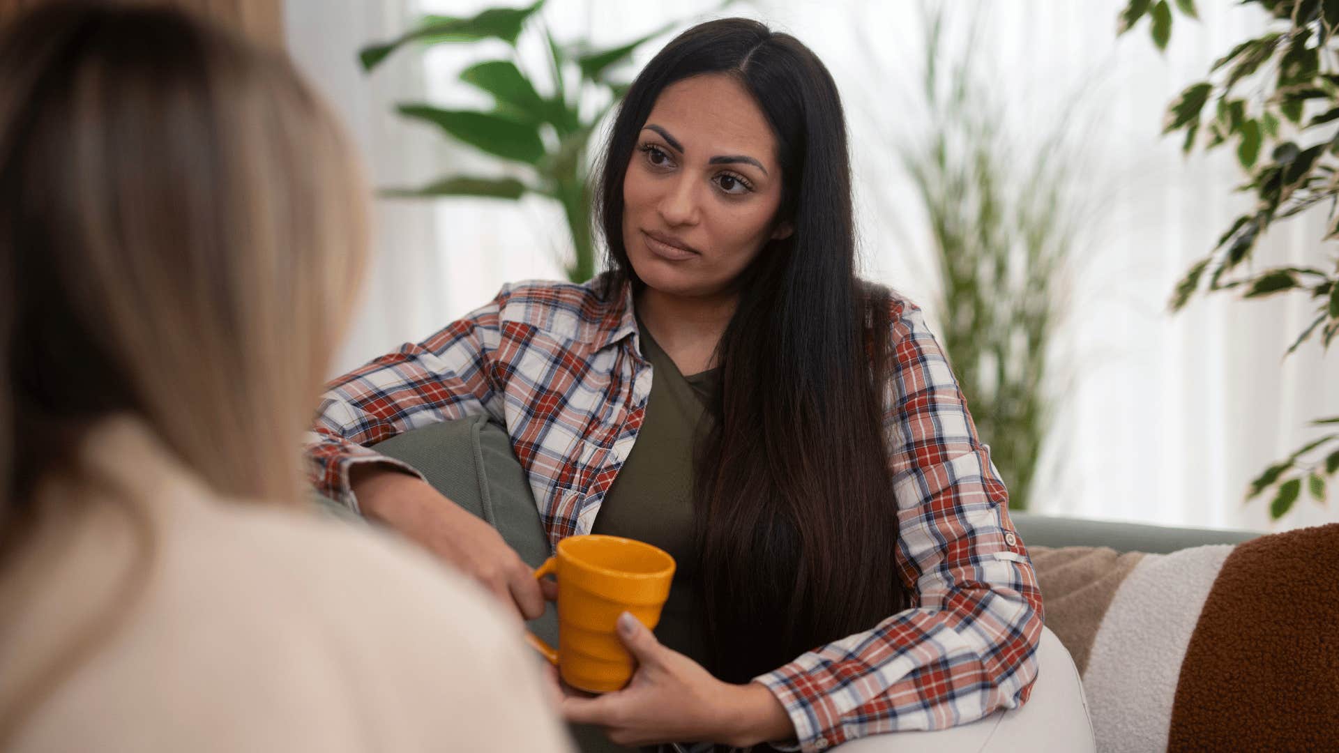woman lacking critical thinking skills saying it's not that deep to friend in conversation