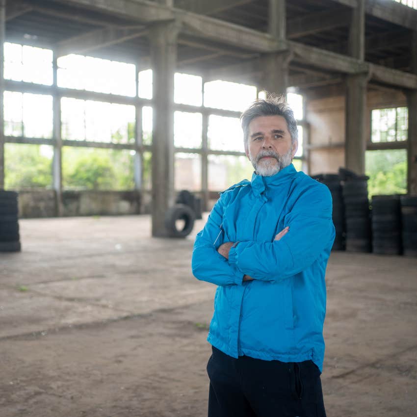 man who's squatting in an abandoned building