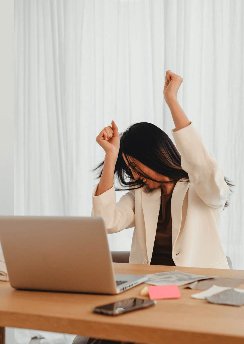 successful woman celebrating