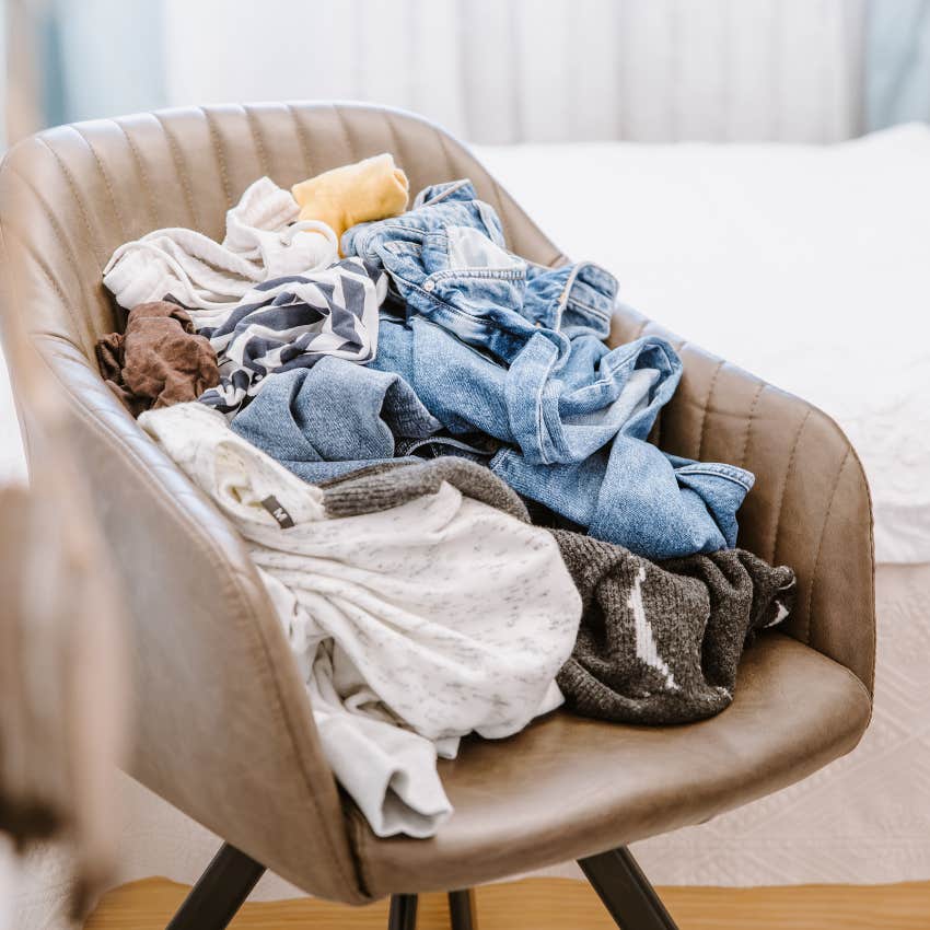pile of clothes on a bedroom chair bad luck feng shui