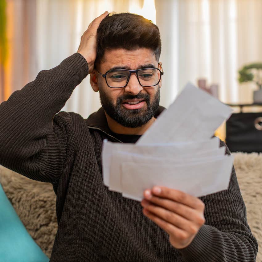man who grew up in a middle class family dealing with debt