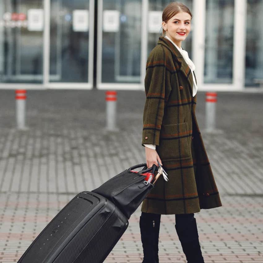 woman dressed up to travel was a common boomer experience