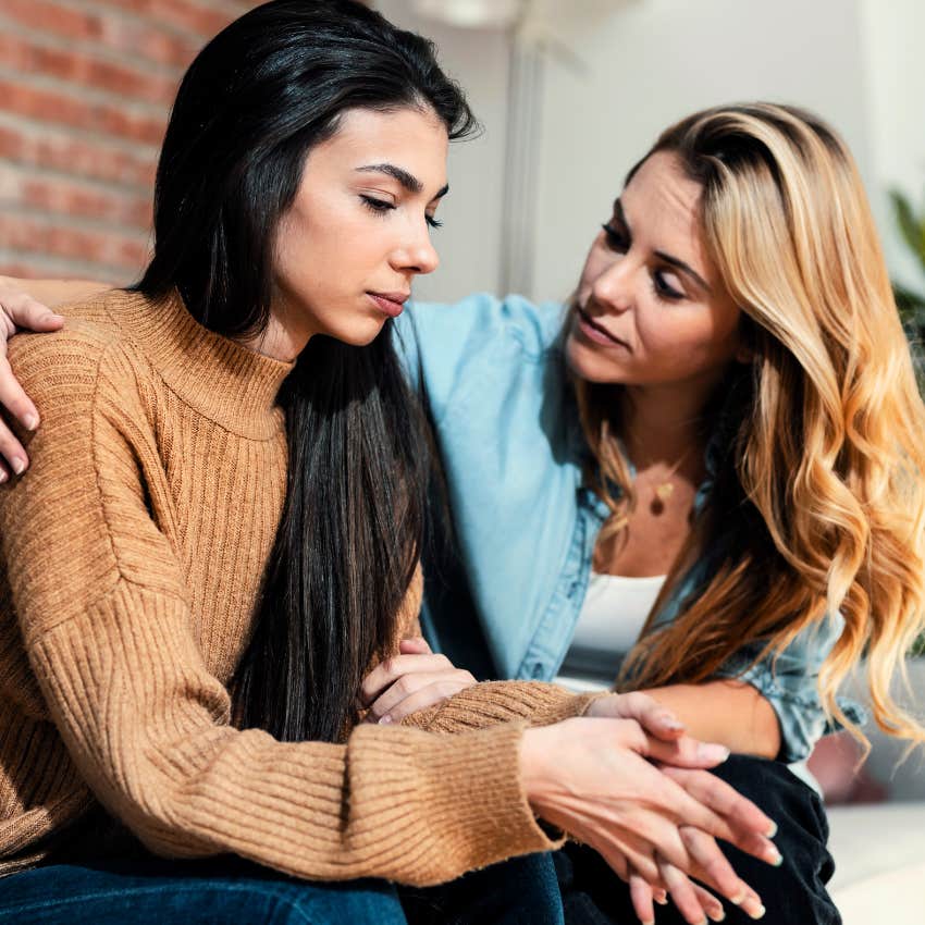 Woman being the therapist friend with another person at home.