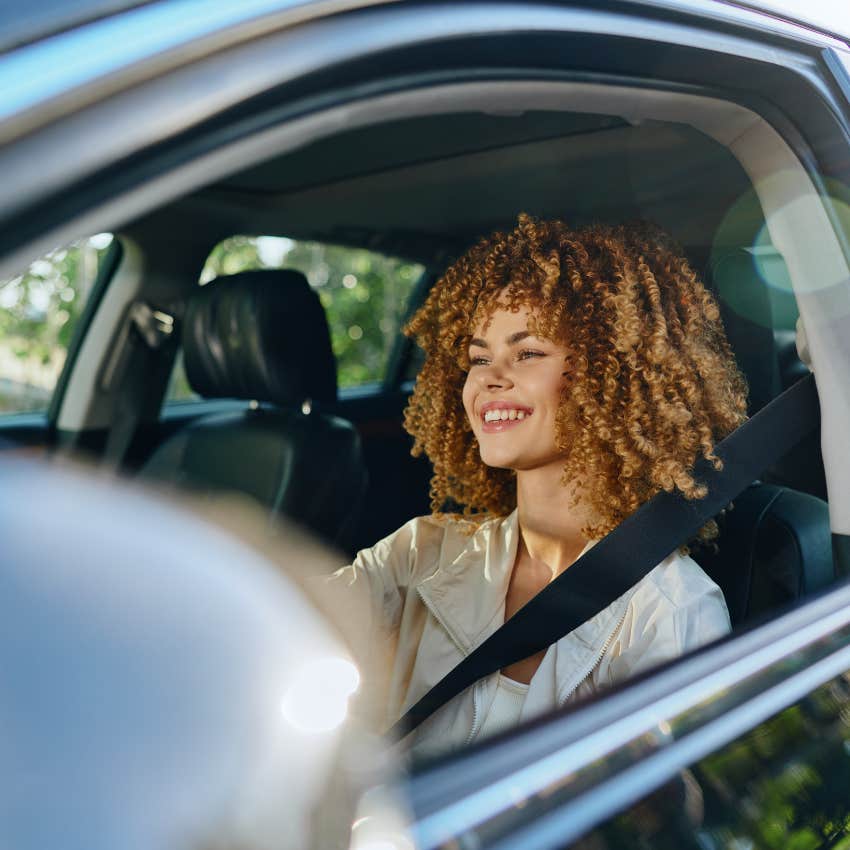 gen z woman using gps instead of printed directions like gen xers and boomers