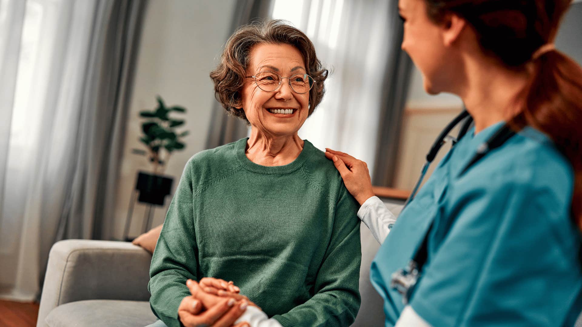 older woman receiving healthcare from professional