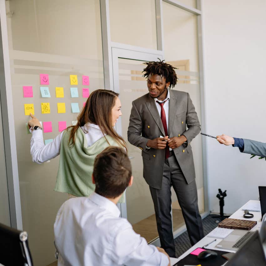 man with a high IQ pretending not to understand his co-worker's witty commentary