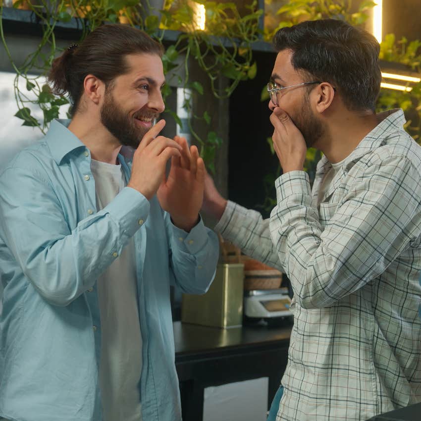 two friends entertaining gossip and unnecessary criticism at work
