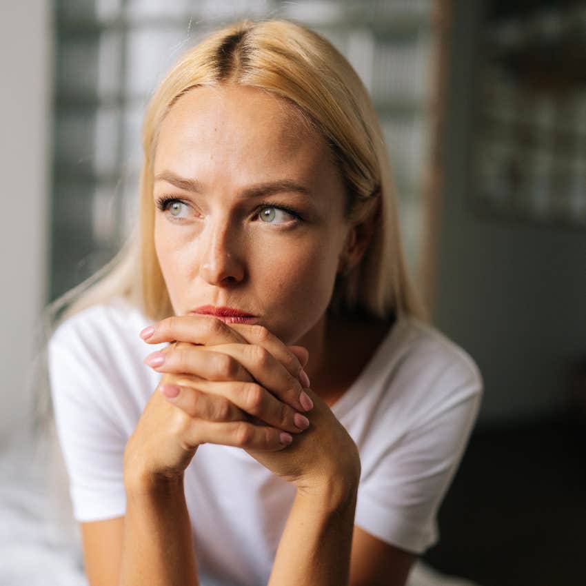 woman overanalyzing things about the person she's attached to