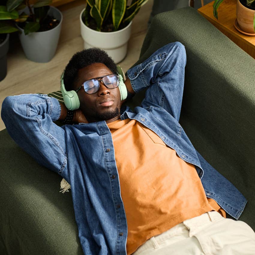 Man with a need for rest lying down at home.