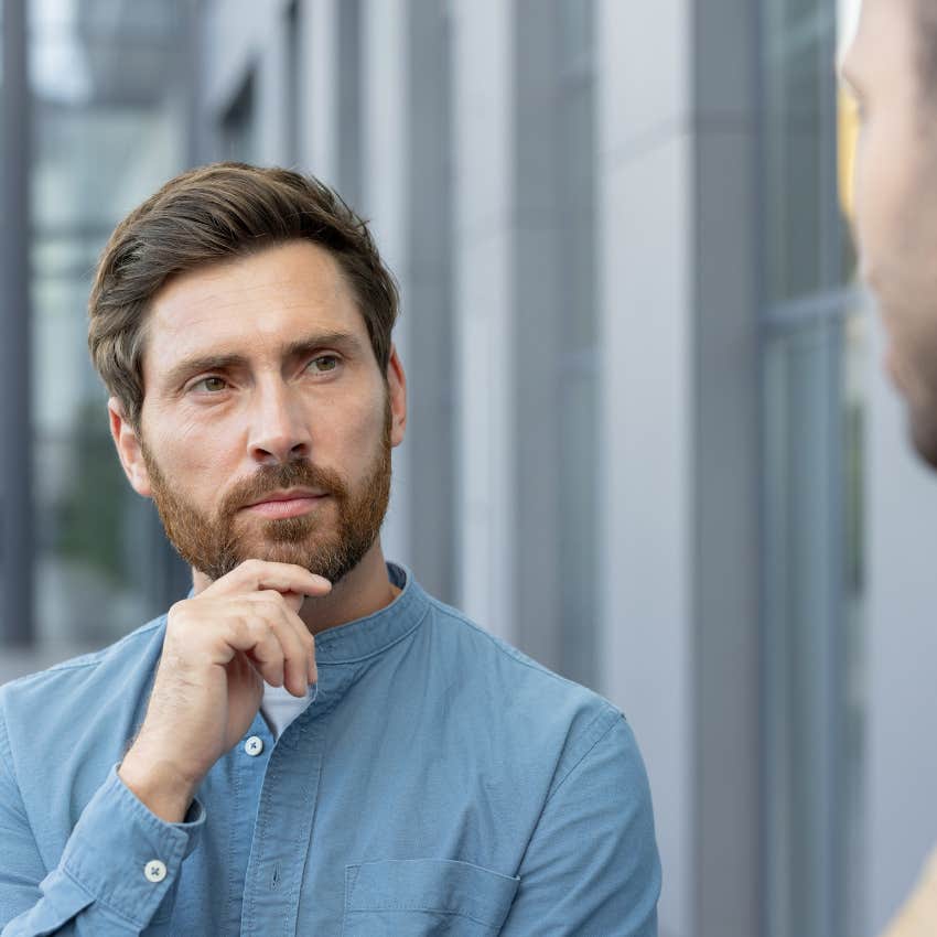 thoughtful man listening to friend speak without interrupting