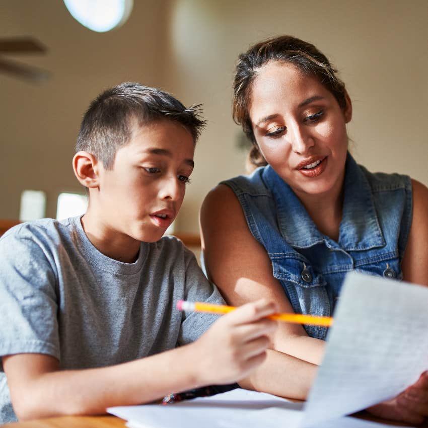 mom helping her son with homework