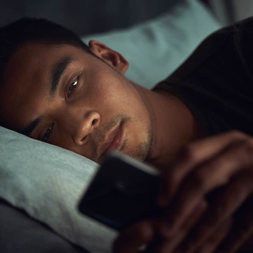 too many gen z men are remaining at home according to a certified parenting coach gen z man on phone cant find job not because of laziness