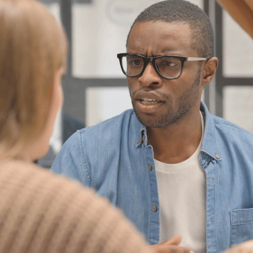 intelligent man having a hard time listening to simple explanations from colleague