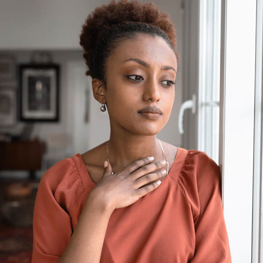 highly intelligent woman second-guessing everything looking upset