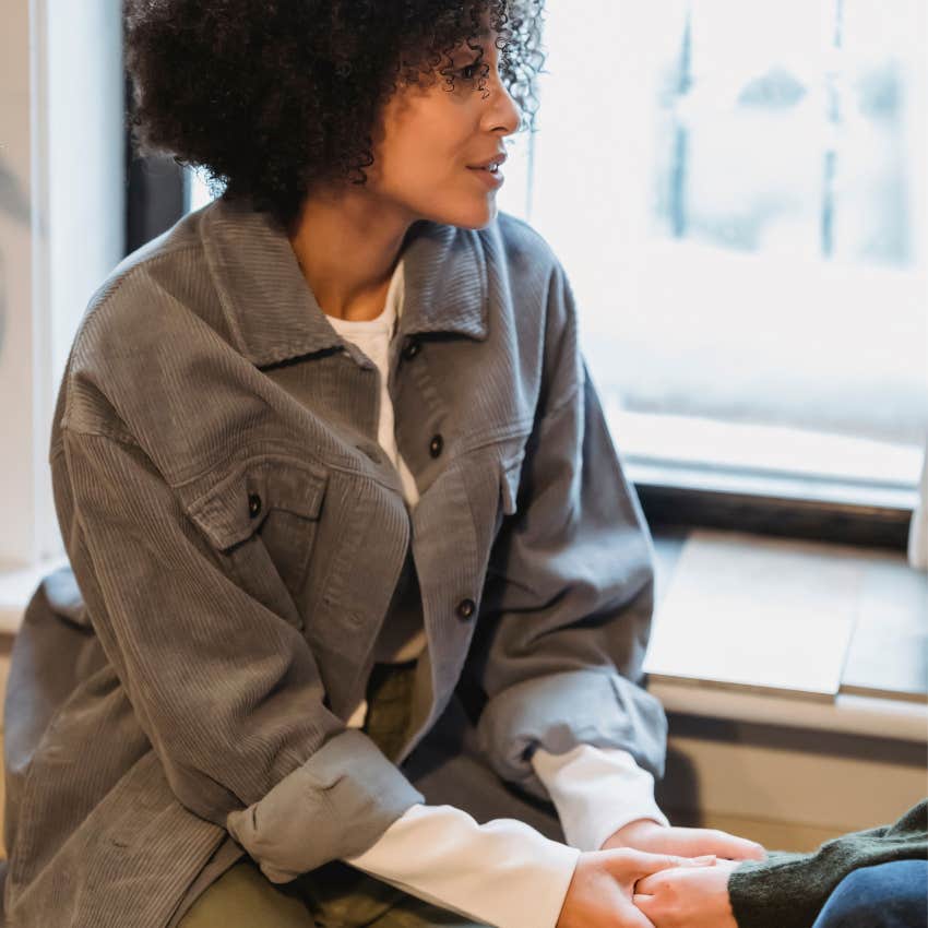 Supportive woman listening attentively as a friend shares something difficult