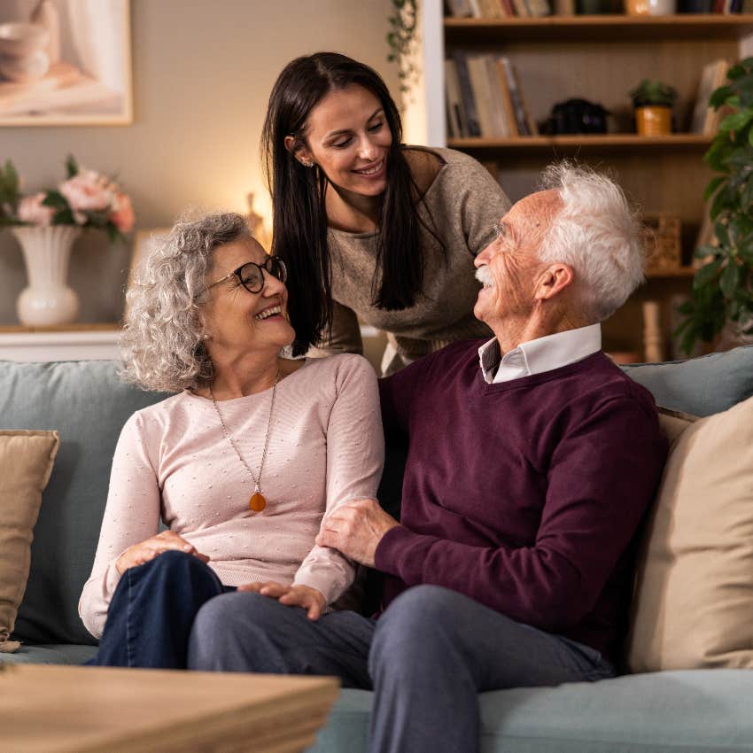 adult daughter with senior parents