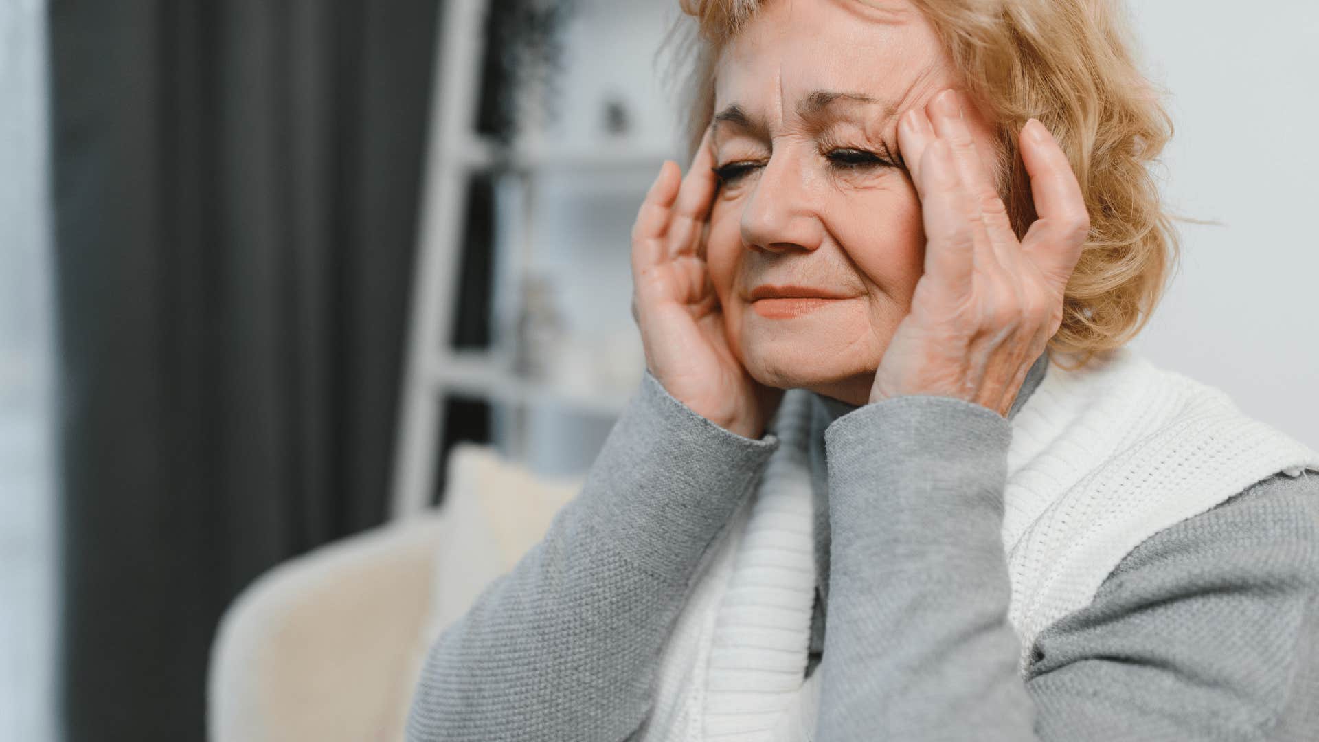 older woman who is struggling but won't talk about it