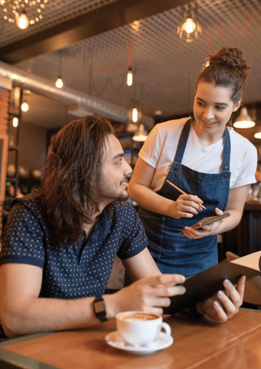 waitress interacting with a male customer