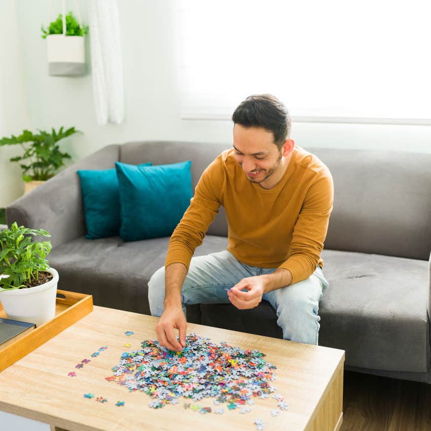 man solving puzzles at home after his frontal cortex has developed