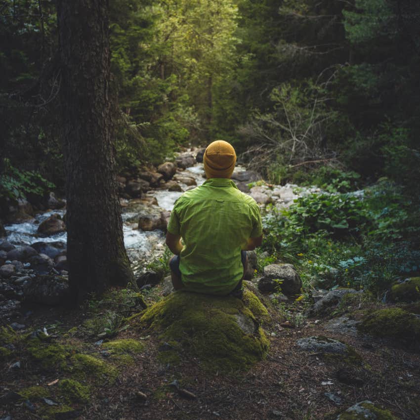happy man in nature living off the grid