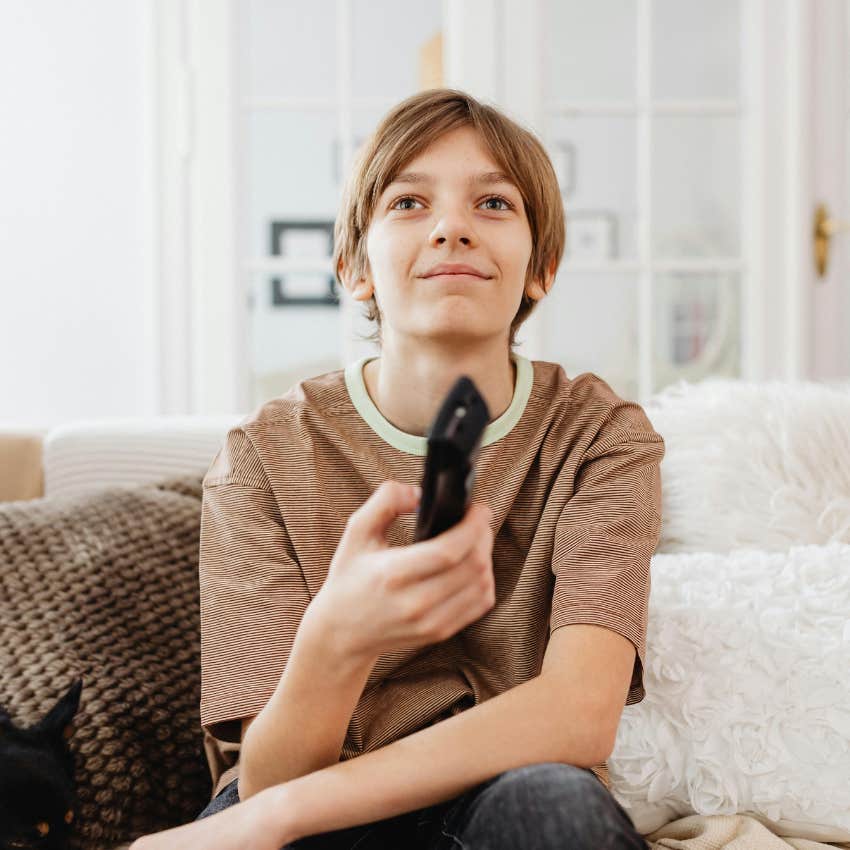 millennial kid learning about media literacy from watching tv