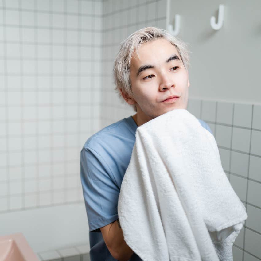 man using the same towel for everything