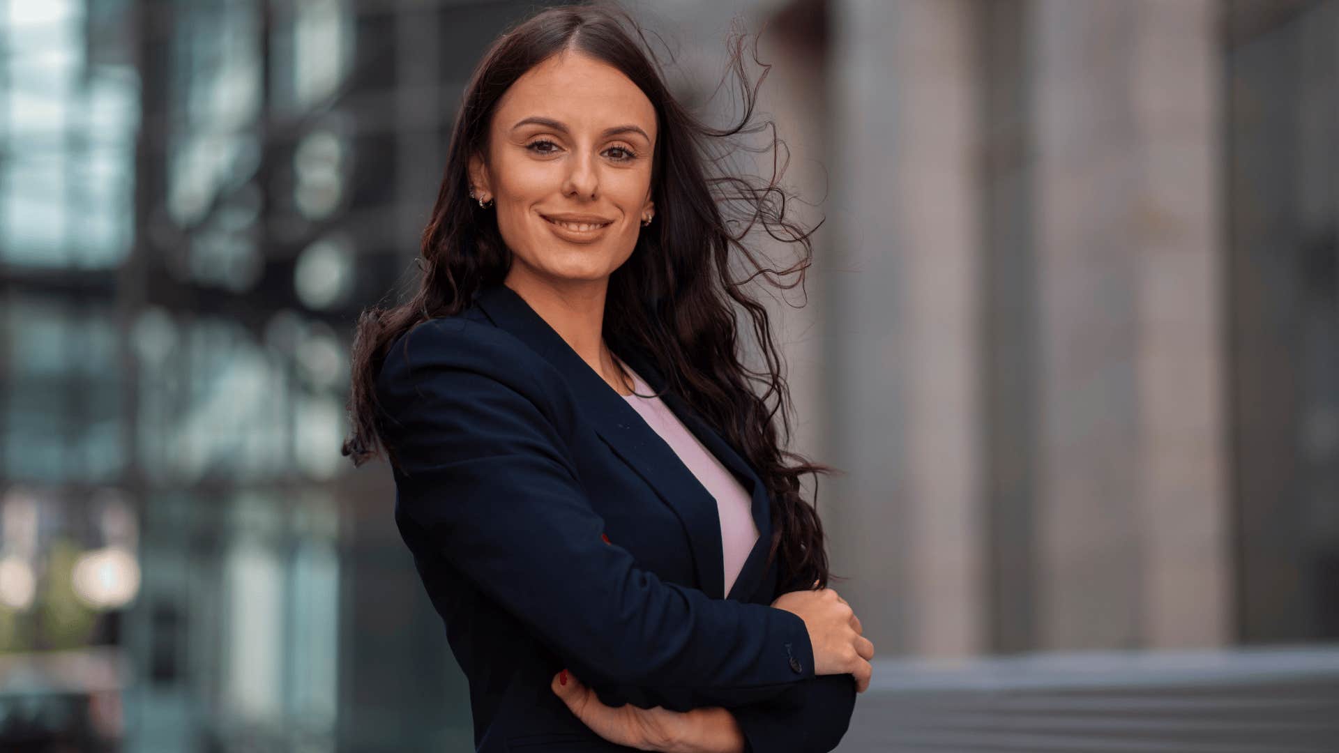 independent woman looking confident outside work