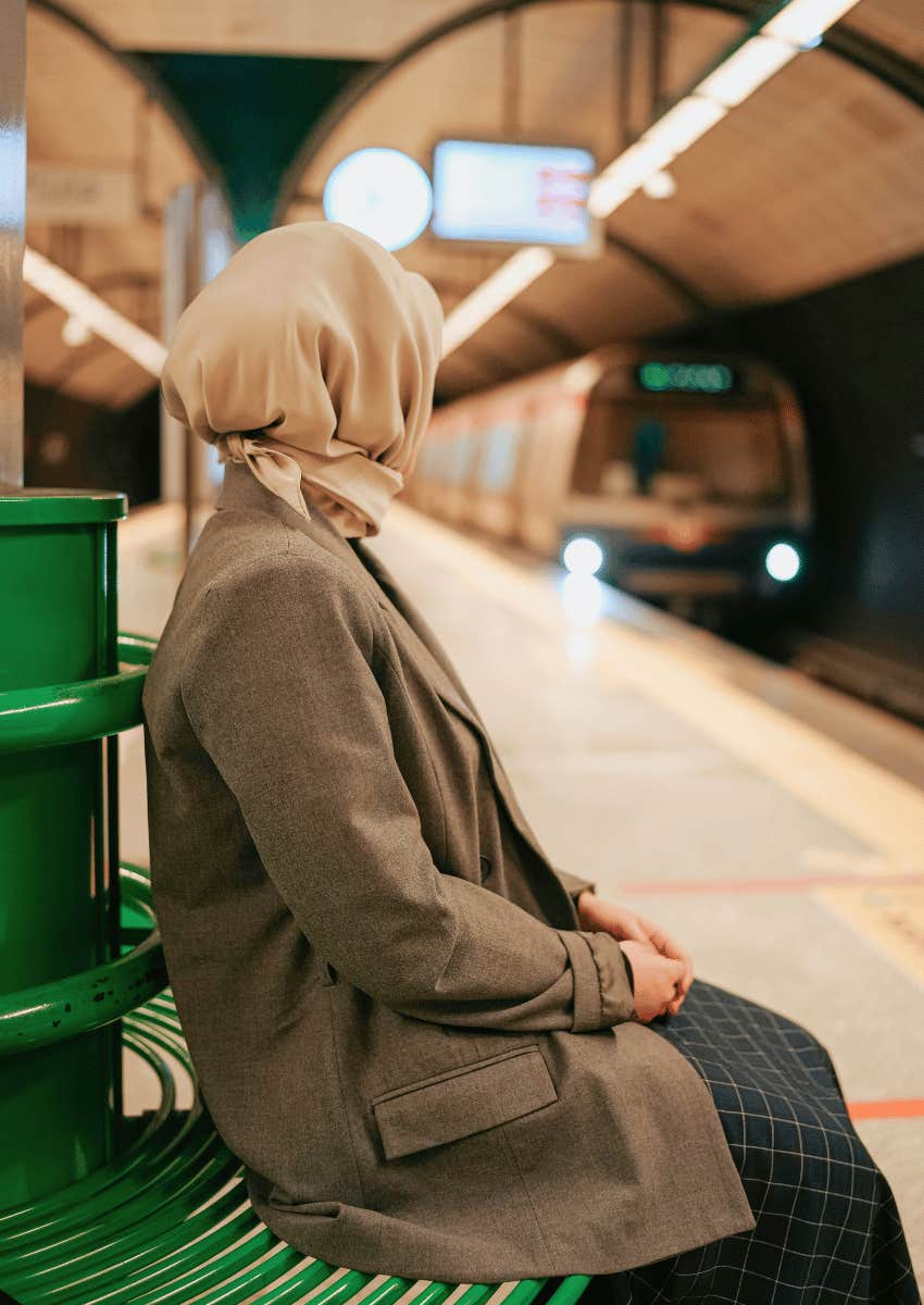 woman waiting at the train station
