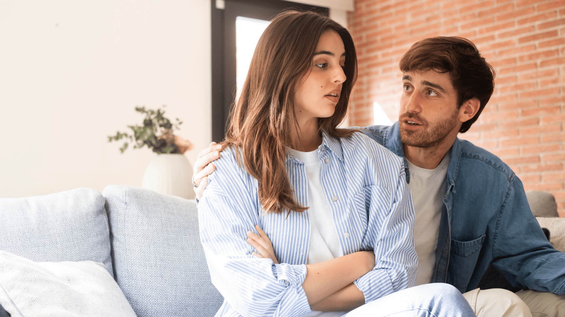 woman challenging outdated dynamics turned away from partner