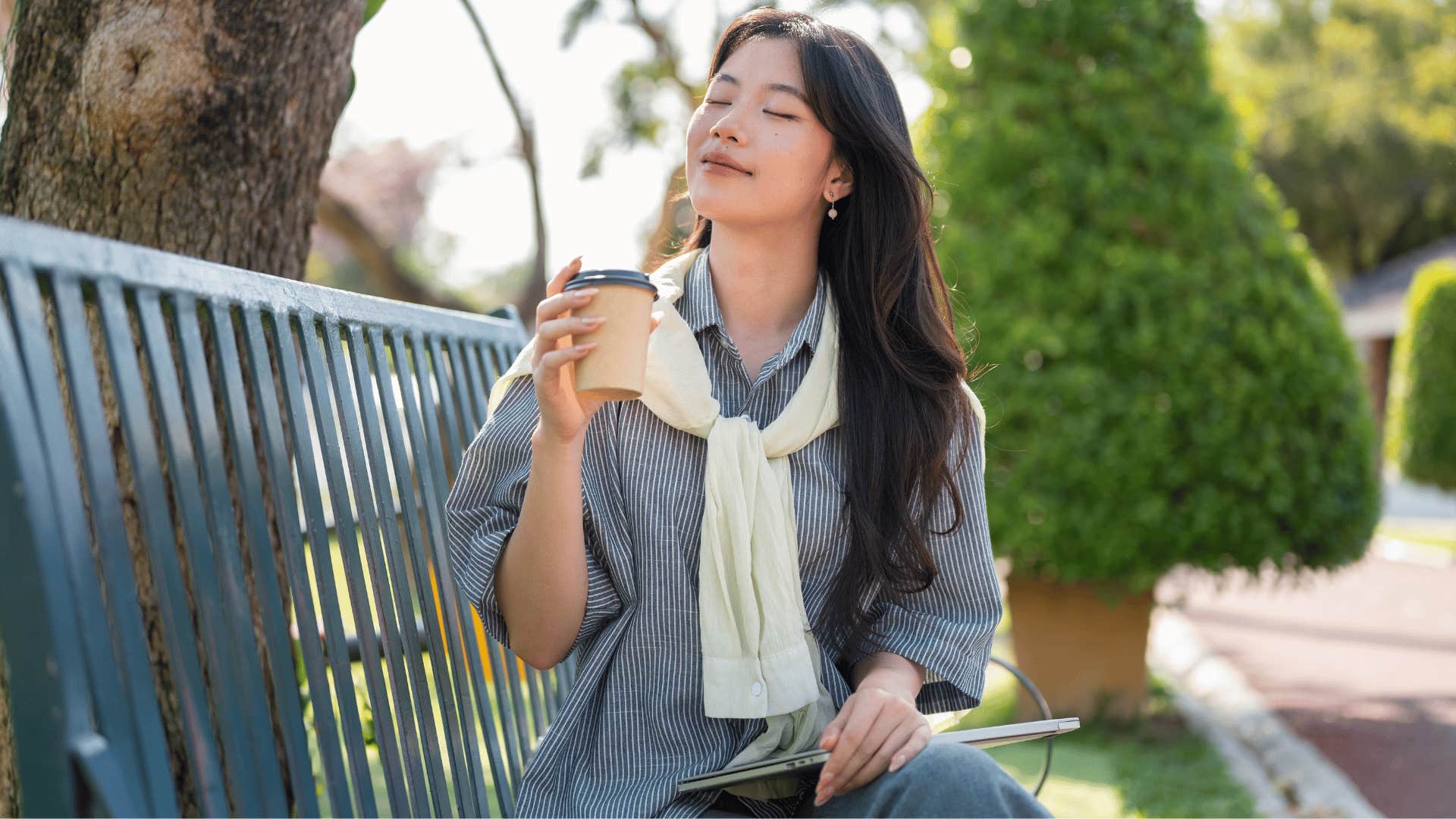 woman drinking coffee outside enjoying the little things